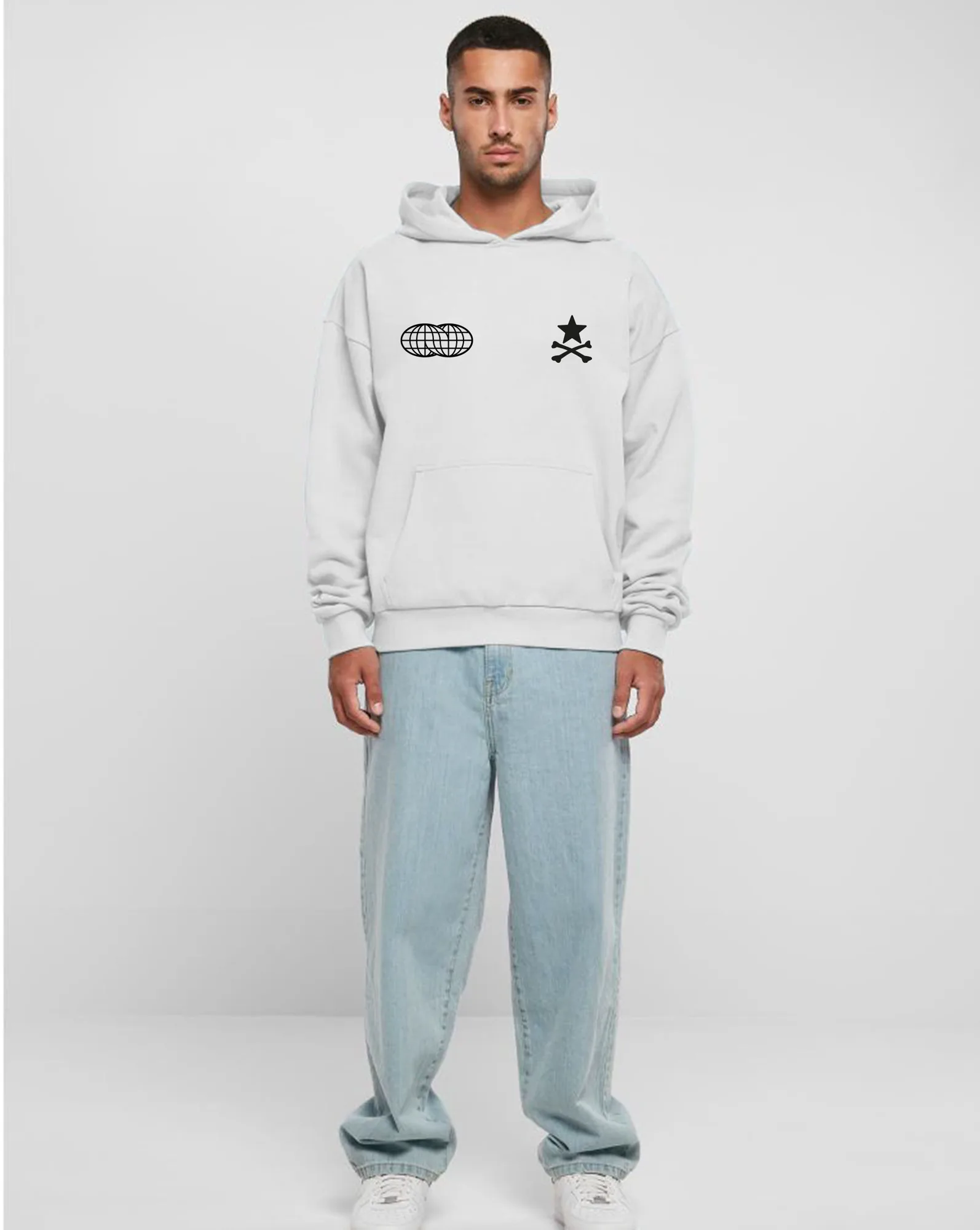 Model wearing the white Flight Mode oversized hoodie