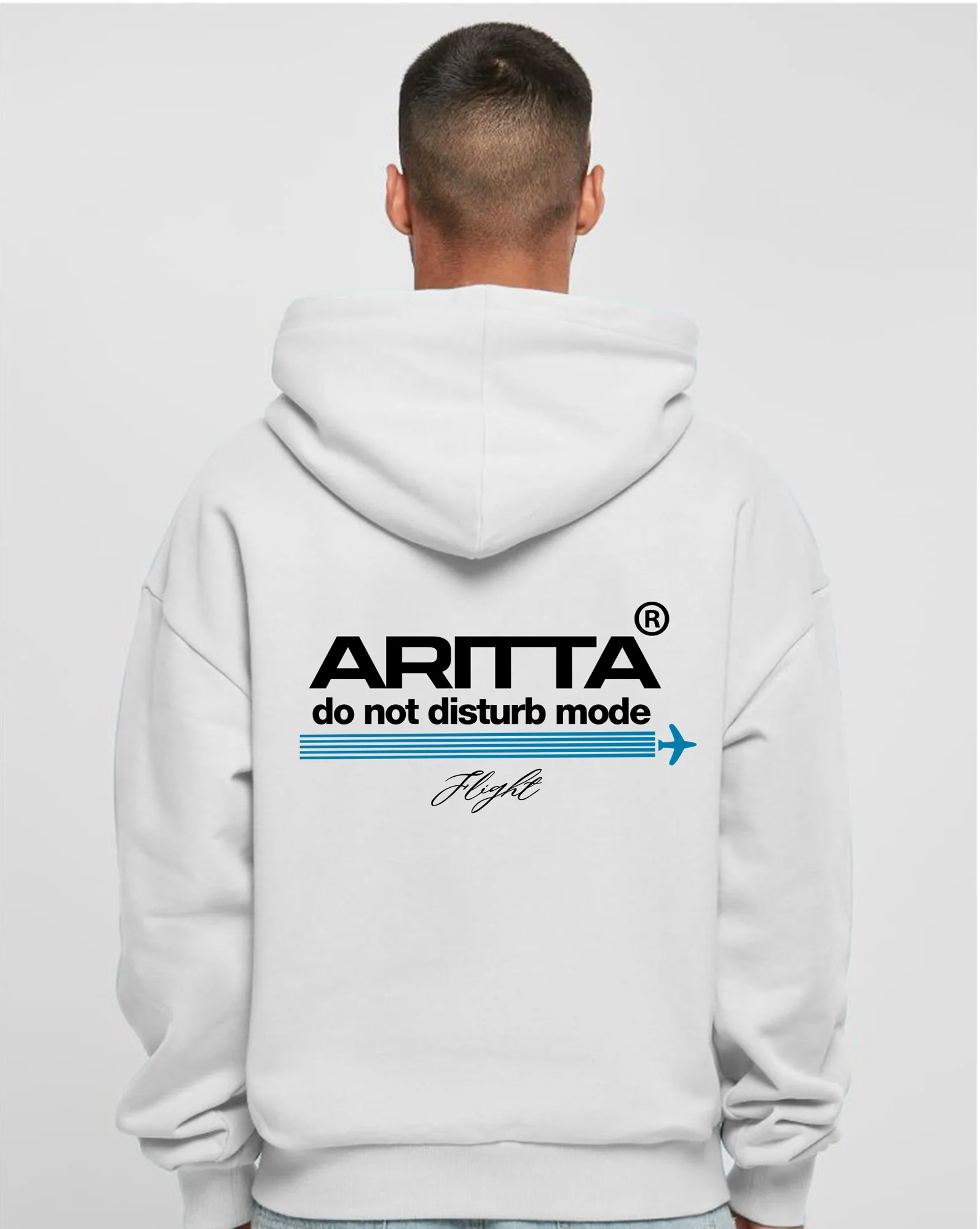 Back print of the white Flight Mode oversized hoodie on a model