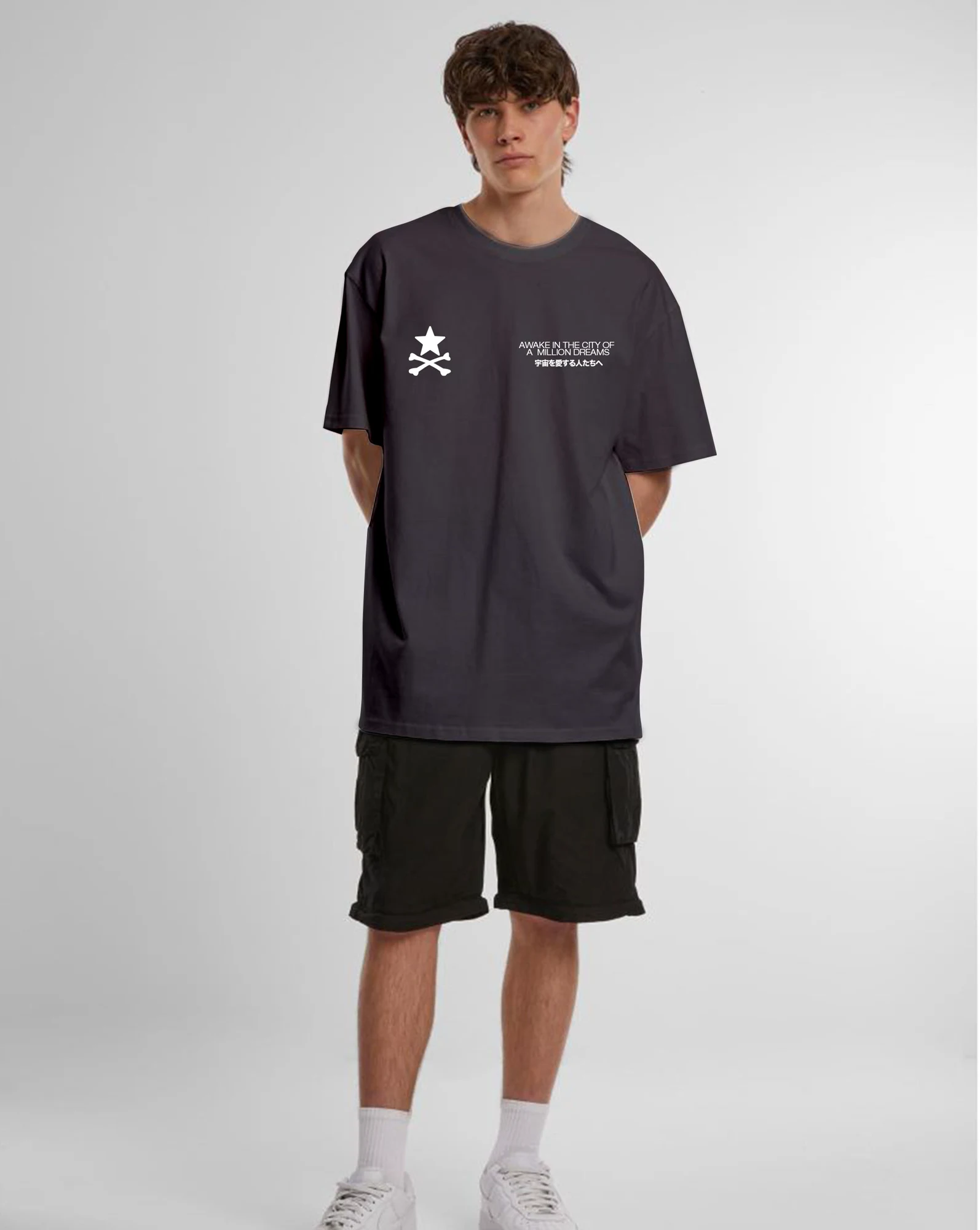 Model wearing the dark grey Awake in the City oversized T-shirt