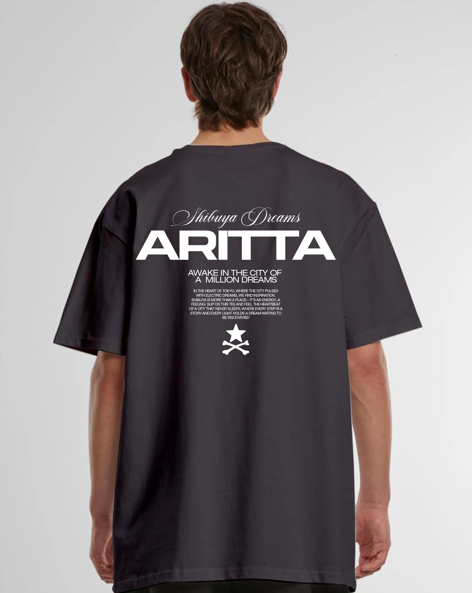 Back print of the dark grey Awake in the City oversized T-shirt on a model