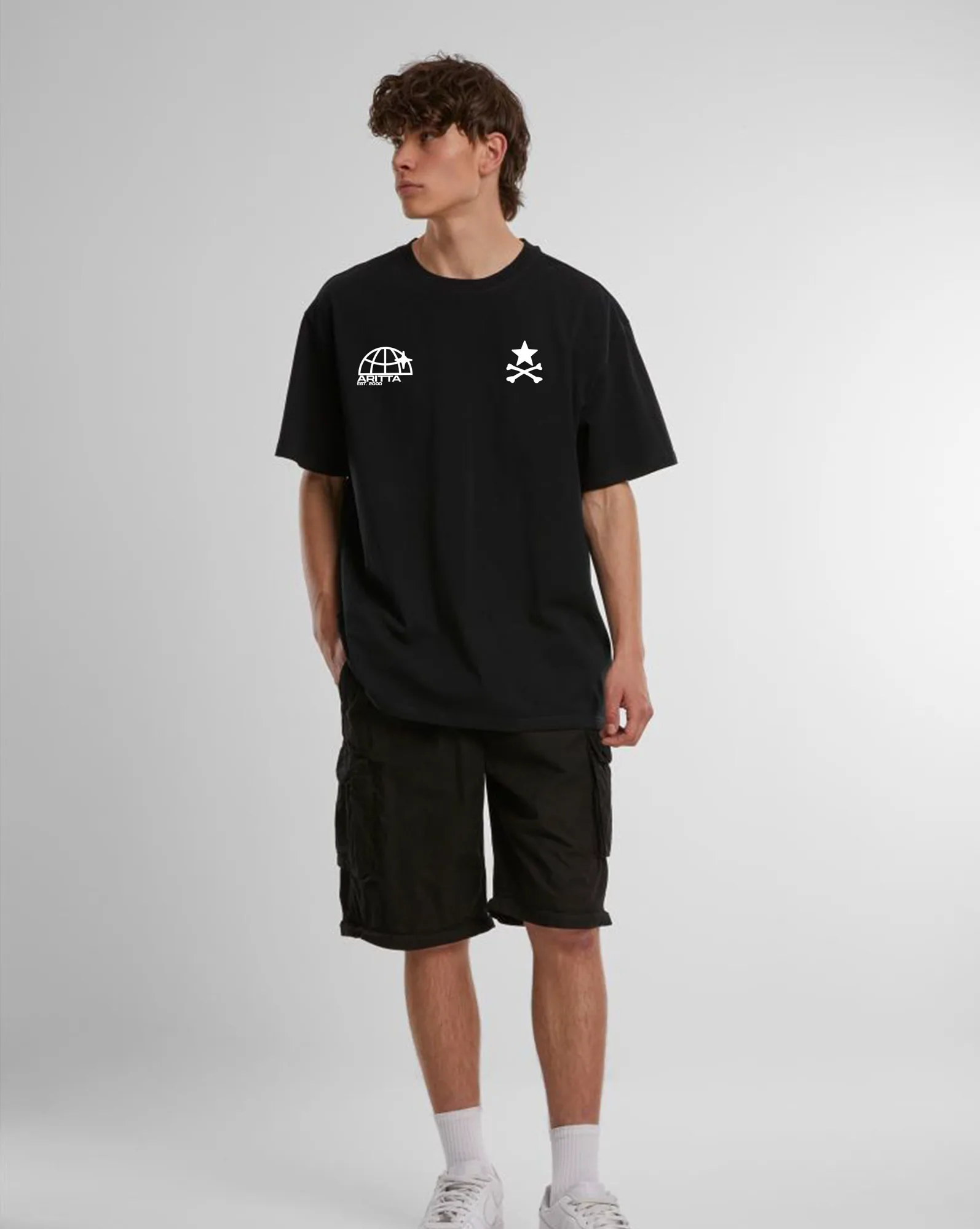 Model wearing the Black Shibuya Dreams oversized T-shirt